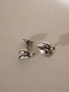 Paire de bouton de manchette création artisanale sans poinçons mais très bien faite en argent massif. 