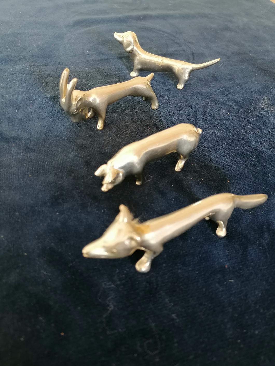4 portes coûteaux animaux en étain fin Swissmade