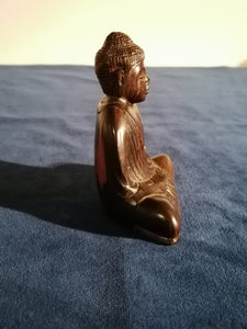 Bouddha en bois de palissandre  sculpté, XXème 